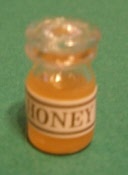 Honigglas mit Honig