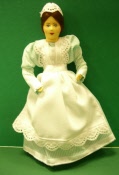 Biegepuppe Hausmädchen mint Kleid 